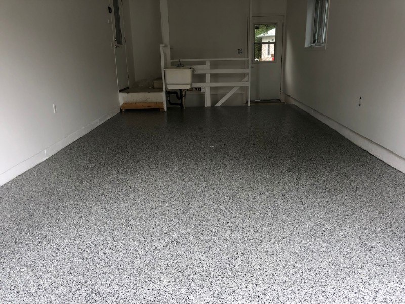 garage-residentiel-plancher-beton-reparation-Epoxy-polyurea-flocons-Prostationnement